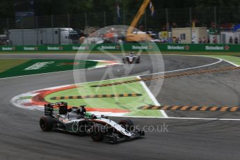 World © Octane Photographic Ltd. Sahara Force India VJM09 - Nico Hulkenberg and Haas F1 Team VF-16 – Romain Grosjean. Sunday 4th September 2016, F1 Italian GP Race, Monza, Italy. Digital Ref :1710LB2D7238