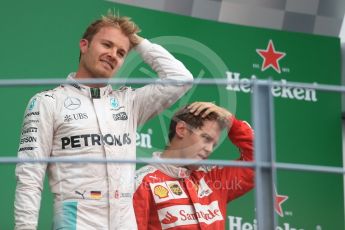 World © Octane Photographic Ltd. Mercedes AMG Petronas – Nico Rosberg (1st) and Scuderia Ferrari – Sebastian Vettel (3rd). Sunday 4th September 2016, F1 Italian GP Podium, Monza, Italy. Digital Ref :1711LB1D0898