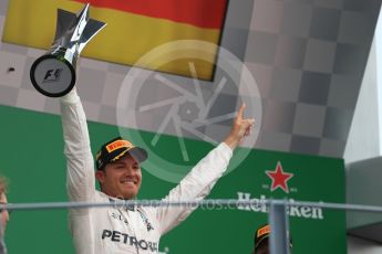 World © Octane Photographic Ltd. Mercedes AMG Petronas – Nico Rosberg (1st). Sunday 4th September 2016, F1 Italian GP Podium, Monza, Italy. Digital Ref :1711LB1D0960