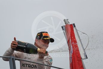 World © Octane Photographic Ltd. Mercedes AMG Petronas – Nico Rosberg (1st). Sunday 4th September 2016, F1 Italian GP Podium, Monza, Italy. Digital Ref :1711LB1D1054