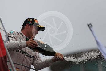 World © Octane Photographic Ltd. Mercedes AMG Petronas – Nico Rosberg (1st). Sunday 4th September 2016, F1 Italian GP Podium, Monza, Italy. Digital Ref :1711LB1D1072