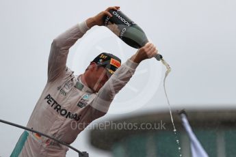 World © Octane Photographic Ltd. Mercedes AMG Petronas – Nico Rosberg (1st). Sunday 4th September 2016, F1 Italian GP Podium, Monza, Italy. Digital Ref :1711LB1D1081