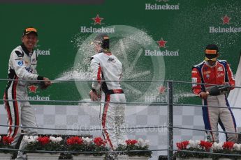 World © Octane Photographic Ltd. ART Grand Prix – Nyck de Vries (1st) and Alexander Albon (2nd) and Trident – Antonia Fuoco (3rd). Sunday 4th September 2016, GP3 Race 2 Podium, Spa-Francorchamps, Belgium. Digital Ref :1703LB1D9820