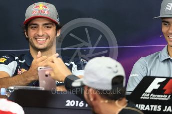 World © Octane Photographic Ltd. F1 Singapore GP FIA Driver Press Conference, Suzuka Circuit, Suzuka, Japan. Thursday 6th October 2016. Scuderia Toro Rosso – Carlos Sainz gets shown a video by Lewis Hamilton. Digital Ref : 1727LB1D3353