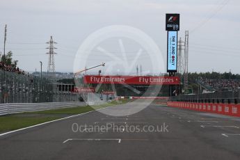 World © Octane Photographic Ltd. Empty starting grid and the run to turn 1. Sunday 9th October 2016, F1 Japanese GP, Suzuka Circuit, Suzuka, Japan. Digital Ref :1735LB1D6950