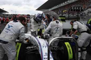 World © Octane Photographic Ltd. Williams Martini Racing, Williams Mercedes FW38 – Valtteri Bottas. Sunday 9th October 2016, F1 Japanese GP - Grid, Suzuka Circuit, Suzuka, Japan. Digital Ref :1735LB1D7248