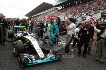 World © Octane Photographic Ltd. Mercedes AMG Petronas W07 Hybrid – Nico Rosberg. Sunday 9th October 2016, F1 Japanese GP - Grid. Suzuka Circuit, Suzuka, Japan. Digital Ref :1735LB1D7324