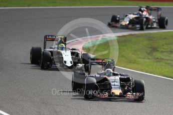 World © Octane Photographic Ltd. Scuderia Toro Rosso STR11 – Carlos Sainz and Daniil Kvyat with Sahara Force India VJM09 - Sergio Perez. Friday 7th October 2016, F1 Japanese GP - Practice 1, Suzuka Circuit, Suzuka, Japan. Digital Ref :1728LB1D3655