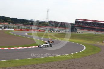 World © Octane Photographic Ltd. Mercedes AMG Petronas W07 Hybrid – Lewis Hamilton and Red Bull Racing RB12 – Daniel Ricciardo. Friday 7th October 2016, F1 Japanese GP - Practice 1. Suzuka Circuit, Suzuka, Japan. Digital Ref :1728LB2D1748