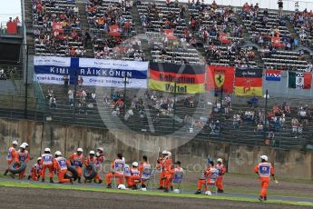 World © Octane Photographic Ltd. Marshals do a pit stop on the safety car. Saturday 8th October 2016, F1 Japanese GP - Qualifying, Suzuka Circuit, Suzuka, Japan. Digital Ref : 1733LB2D3737