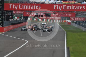 World © Octane Photographic Ltd. Mercedes AMG Petronas W07 Hybrid – Nico Rosberg leads the pack off the line as Lewis Hamilton makes a poor start. Sunday 9th October 2016, F1 Japanese GP - Race. Suzuka Circuit, Suzuka, Japan. Digital Ref :