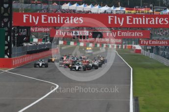 World © Octane Photographic Ltd. Mercedes AMG Petronas W07 Hybrid – Nico Rosberg leads the pack off the line as Lewis Hamilton makes a poor start. Sunday 9th October 2016, F1 Japanese GP - Race. Suzuka Circuit, Suzuka, Japan. Digital Ref :