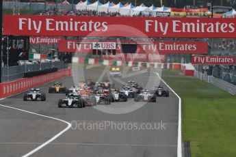 World © Octane Photographic Ltd. Mercedes AMG Petronas W07 Hybrid – Nico Rosberg leads the pack off the line as Lewis Hamilton makes a poor start. Sunday 9th October 2016, F1 Japanese GP - Race. Suzuka Circuit, Suzuka, Japan. Digital Ref :