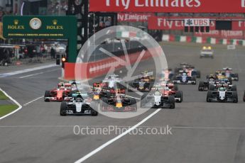 World © Octane Photographic Ltd. Mercedes AMG Petronas W07 Hybrid – Nico Rosberg leads the pack off the line as Lewis Hamilton makes a poor start and drops down the order. Sunday 9th October 2016, F1 Japanese GP - Race. Suzuka Circuit, Suzuka, Japan. Digital Ref :