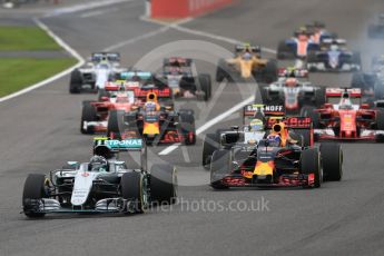 World © Octane Photographic Ltd. Mercedes AMG Petronas W07 Hybrid – Nico Rosberg leads the Red Bull Racing RB12 of Max Verstappen and Sahara Force India VJM09 of Sergio Perez in to turn 1. Sunday 9th October 2016, F1 Japanese GP - Race. Suzuka Circuit, Suzuka, Japan. Digital Ref :