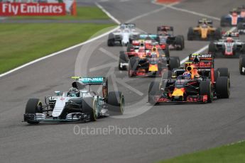 World © Octane Photographic Ltd. Mercedes AMG Petronas W07 Hybrid – Nico Rosberg leads the Red Bull Racing RB12 of Max Verstappen and Sahara Force India VJM09 of Sergio Perez in to turn 1. Sunday 9th October 2016, F1 Japanese GP - Race. Suzuka Circuit, Suzuka, Japan. Digital Ref :