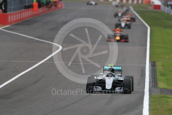 World © Octane Photographic Ltd. Lap 2 - Mercedes AMG Petronas W07 Hybrid – Nico Rosberg leads the Red Bull Racing RB12 of Max Verstappen and the Sahara Force India VJM09 of Sergio Perez. Sunday 9th October 2016, F1 Japanese GP - Race. Suzuka Circuit, Suzuka, Japan. Digital Ref :