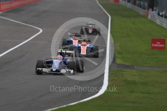 World © Octane Photographic Ltd. Sauber F1 Team C35 – Felipe Nasr and Manor Racing MRT05 - Esteban Ocon and Pascal Wehrlein. Sunday 9th October 2016, F1 Japanese GP - Race, Suzuka Circuit, Suzuka, Japan. Digital Ref :