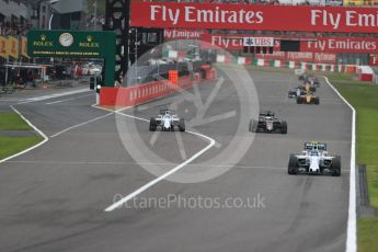 World © Octane Photographic Ltd. Williams Martini Racing, Williams Mercedes FW38 – Valtteri Bottas and Felipe Massa and McLaren Honda MP4-31 – Fernando Alonso. Sunday 9th October 2016, F1 Japanese GP - Race, Suzuka Circuit, Suzuka, Japan. Digital Ref :