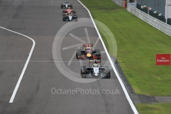 World © Octane Photographic Ltd. Sahara Force India VJM09 - Sergio Perez and Red Bull Racing RB12 – Daniel Ricciardo. Sunday 9th October 2016, F1 Japanese GP - Race, Suzuka Circuit, Suzuka, Japan. Digital Ref :