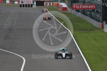 World © Octane Photographic Ltd. Mercedes AMG Petronas W07 Hybrid – Nico Rosberg leads the Red Bull Racing RB12 of Max Verstappen and the distant Scuderia Ferrari SF16-H of Sebastian Vettel. Sunday 9th October 2016, F1 Japanese GP - Race. Suzuka Circuit, Suzuka, Japan. Digital Ref :