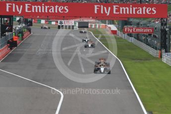 World © Octane Photographic Ltd. Sahara Force India VJM09 - Sergio Perez and Red Bull Racing RB12 – Daniel Ricciardo. Sunday 9th October 2016, F1 Japanese GP - Race, Suzuka Circuit, Suzuka, Japan. Digital Ref :