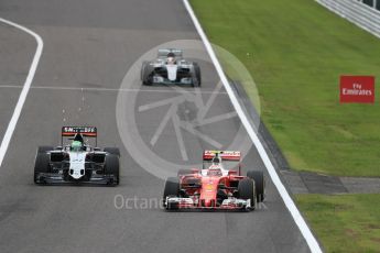 World © Octane Photographic Ltd. Sahara Force India VJM09 of Nico Hulkenberg and the Scuderia Ferrari SF16-H of Kimi Raikkonen with the Mercedes AMG Petronas W07 Hybrid of Lewis Hamilton gaining ground. Sunday 9th October 2016, F1 Japanese GP - Race, Suzuka Circuit, Suzuka, Japan. Digital Ref :