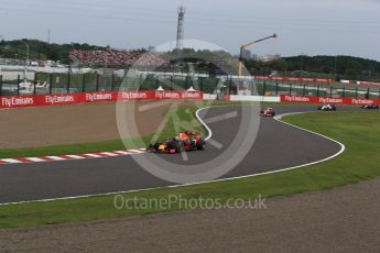 World © Octane Photographic Ltd. Red Bull Racing RB12 – Daniel Ricciardo and Scuderia Ferrari SF16-H – Kimi Raikkonen. Sunday 9th October 2016, F1 Japanese GP - Race, Suzuka Circuit, Suzuka, Japan. Digital Ref :