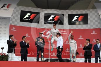 World © Octane Photographic Ltd. Mercedes AMG Petronas – Nico Rosberg (1st) Red Bull Racing – Max Verstappen (2nd) and Mercedes AMG Petronas – Lewis Hamilton (3rd). Sunday 9th October 2016, F1 Japanese GP - Podium. Suzuka Circuit, Suzuka, Japan. Digital Ref :1737LB1D8419