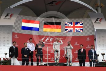 World © Octane Photographic Ltd. Mercedes AMG Petronas – Nico Rosberg (1st), Red Bull Racing – Max Verstappen (2nd) and Mercedes AMG Petronas – Lewis Hamilton (3rd). Sunday 9th October 2016, F1 Japanese GP - Podium. Suzuka Circuit, Suzuka, Japan. Digital Ref :1737LB1D8438