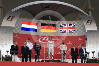 World © Octane Photographic Ltd. Mercedes AMG Petronas – Nico Rosberg (1st), Red Bull Racing – Max Verstappen (2nd) and Mercedes AMG Petronas – Lewis Hamilton (3rd). Sunday 9th October 2016, F1 Japanese GP - Podium. Suzuka Circuit, Suzuka, Japan. Digital Ref :1737LB1D8468