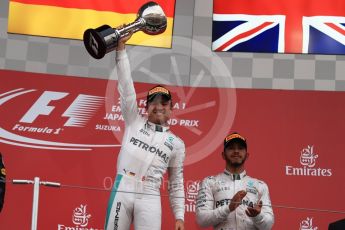 World © Octane Photographic Ltd. Mercedes AMG Petronas – Nico Rosberg (1st) and Lewis Hamilton (3rd). Sunday 9th October 2016, F1 Japanese GP - Podium. Suzuka Circuit, Suzuka, Japan. Digital Ref :1737LB1D8516