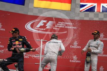 World © Octane Photographic Ltd. Mercedes AMG Petronas – Nico Rosberg (1st), Red Bull Racing – Max Verstappen (2nd) and Mercedes AMG Petronas – Lewis Hamilton (3rd). Sunday 9th October 2016, F1 Japanese GP - Podium. Suzuka Circuit, Suzuka, Japan. Digital Ref :1737LB1D8585