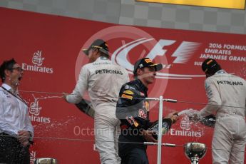 World © Octane Photographic Ltd. Mercedes AMG Petronas – Nico Rosberg (1st), Red Bull Racing – Max Verstappen (2nd) and Mercedes AMG Petronas – Lewis Hamilton (3rd). Sunday 9th October 2016, F1 Japanese GP - Podium. Suzuka Circuit, Suzuka, Japan. Digital Ref :1737LB1D8618