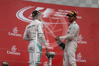 World © Octane Photographic Ltd. Mercedes AMG Petronas – Nico Rosberg (1st) and Lewis Hamilton (3rd). Sunday 9th October 2016, F1 Japanese GP - Podium. Suzuka Circuit, Suzuka, Japan. Digital Ref :1737LB1D8642