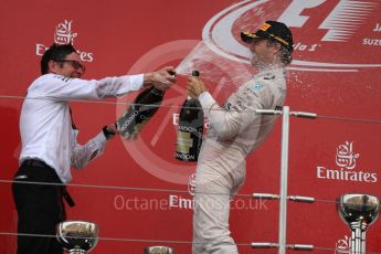 World © Octane Photographic Ltd. Mercedes AMG Petronas – Nico Rosberg (1st). Sunday 9th October 2016, F1 Japanese GP - Podium. Suzuka Circuit, Suzuka, Japan. Digital Ref :1737LB1D8670