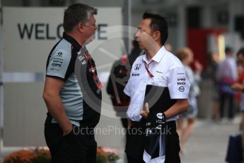 World © Octane Photographic Ltd. McLaren Honda - Yusuke Hasegawa and Otmar Szafnauer. Saturday 8th October 2016, F1 Japanese GP - Paddock, Suzuka Circuit, Suzuka, Japan. Digital Ref : 1731LB2D2614