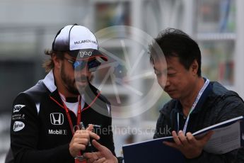 World © Octane Photographic Ltd. McLaren Honda MP4-31 – Fernando Alonso. Sunday 9th October 2016, F1 Japanese GP - Paddock, Suzuka Circuit, Suzuka, Japan. Digital Ref :1734LB2D4265