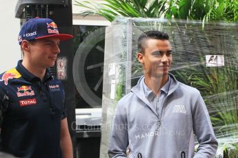 World © Octane Photographic Ltd. Red Bull Racing RB12 – Max Verstappen and Manor Racing MRT05 - Pascal Wehrlein. Wednesday 25th May 2016, F1 Monaco GP Paddock, Monaco, Monte Carlo. Digital Ref :1559CB1D6477