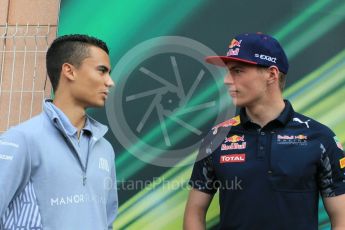 World © Octane Photographic Ltd. Red Bull Racing RB12 – Max Verstappen and Manor Racing MRT05 - Pascal Wehrlein. Wednesday 25th May 2016, F1 Monaco GP Paddock, Monaco, Monte Carlo. Digital Ref :1559CB1D6528