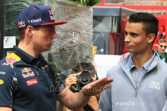 World © Octane Photographic Ltd. Red Bull Racing RB12 – Max Verstappen and Manor Racing MRT05 - Pascal Wehrlein. Wednesday 25th May 2016, F1 Monaco GP Paddock, Monaco, Monte Carlo. Digital Ref :1559CB7D0099