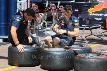 World © Octane Photographic Ltd. Red Bull Racing RB12 – mechanics with Pirelli Hard Tyres. Wednesday 25th May 2016, F1 Monaco GP Paddock, Monaco, Monte Carlo. Digital Ref :1559CB7D9838