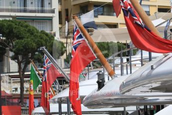 World © Octane Photographic Ltd. Flags on the yachts in the harbour. Wednesday 25th May 2016, F1 Monaco GP Paddock, Monaco, Monte Carlo. Digital Ref :1559CB7D9981