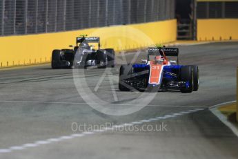 World © Octane Photographic Ltd. Manor Racing MRT05 – Esteban Ocon and Mercedes AMG Petronas W07 Hybrid – Nico Rosberg. Saturday 17th September 2016, F1 Singapore GP Qualifying, Marina Bay Circuit, Singapore. Digital Ref :1721CB1D6621