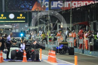 World © Octane Photographic Ltd. Busy pit lane. Saturday 17th September 2016, F1 Singapore GP Qualifying, Marina Bay Circuit, Singapore. Digital Ref :1721CB1D6838