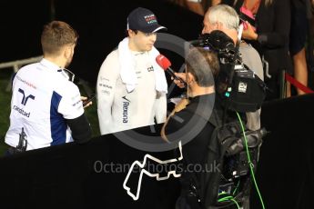 World © Octane Photographic Ltd. Williams Martini Racing, Williams Mercedes FW38 – Felipe Massa and junior press officer Aaron Rook. Saturday 17th September 2016, F1 Singapore GP Qualifying, Marina Bay Circuit, Singapore. Digital Ref :1721LB1D0843