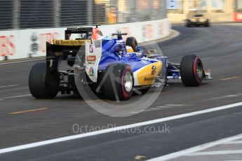 World © Octane Photographic Ltd. Sauber F1 Team C35 – Marcus Ericssonn and Manor Racing MRT05 - Pascal Wehrlein. Friday 16th September 2016, F1 Singapore GP Practice 1, Marina Bay Circuit, Singapore. Digital Ref :