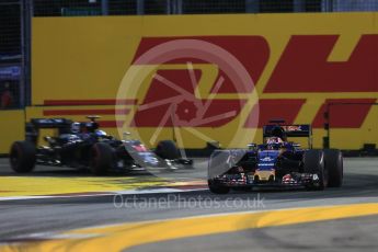 World © Octane Photographic Ltd. Scuderia Toro Rosso STR11 – Daniil Kvyat and McLaren Honda MP4-31 – Fernando Alonso. Friday 16th September 2016, F1 Singapore GP Practice 1, Marina Bay Circuit, Singapore. Digital Ref :