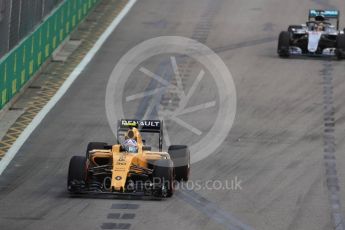 World © Octane Photographic Ltd. Renault Sport F1 Team RS16 – Jolyon Palmer and Mercedes AMG Petronas W07 Hybrid with Halo – Lewis Hamilton. Friday 16th September 2016, F1 Singapore GP Practice 1, Marina Bay Circuit, Singapore. Digital Ref :