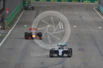 World © Octane Photographic Ltd. Mercedes AMG Petronas W07 Hybrid – Nico Rosberg and Red Bull Racing RB12 – Daniel Ricciardo. Friday 16th September 2016, F1 Singapore GP Practice 1, Marina Bay Circuit, Singapore. Digital Ref :